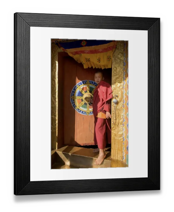 Framed Print : Child monk in Chimi Lhakhang Temple Framed Print : Child monk in Chimi Lhakhang Temple