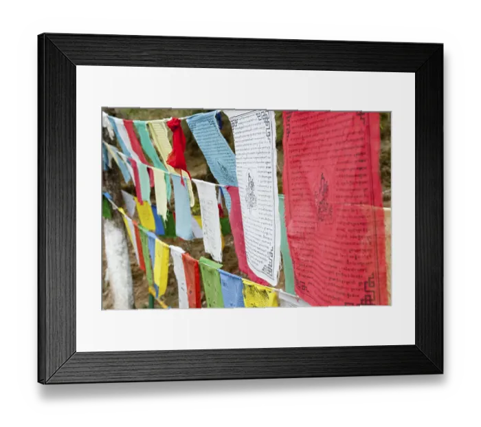 Framed Print : Colorful Tibetan Buddhist prayer flags hanging in rows