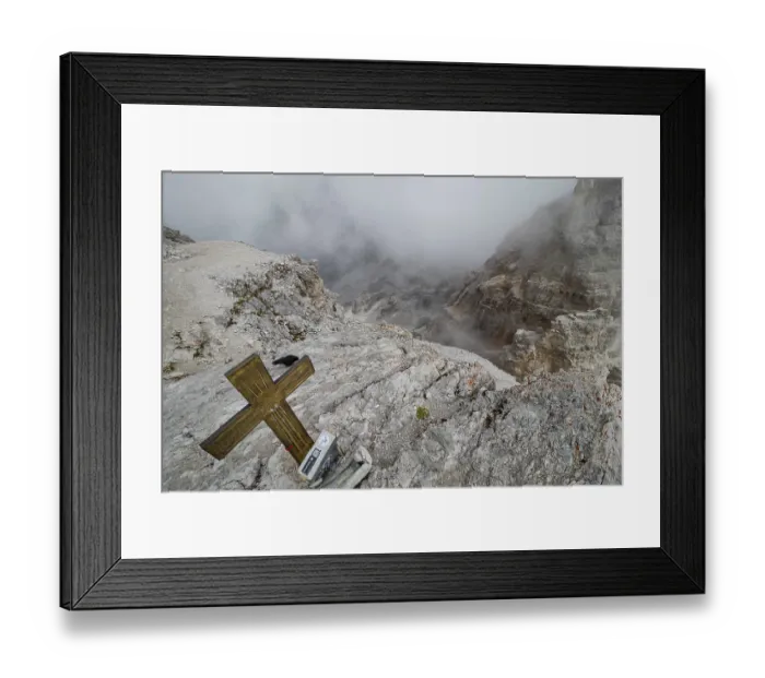 Framed Print : View obscured by clouds from the top of the Cima di Mezzo mountain (3154 m) with a beautiful cross on the top