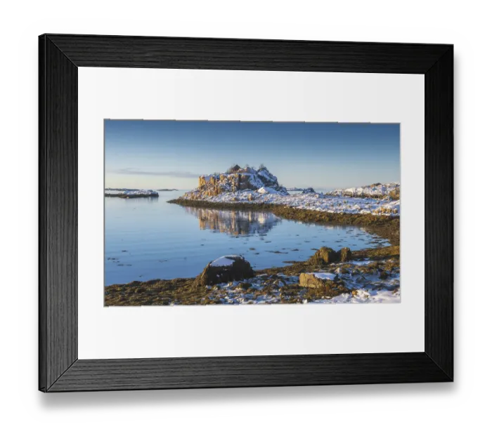 Framed Print : Snowy winter bay with sea grass at low tide Framed Print : Snowy winter bay with sea grass at low tide