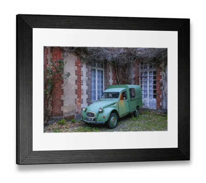 Framed Print : Vintage Citroen 2CV duck in a courtyard Framed Print : Vintage Citroen 2CV duck in a courtyard