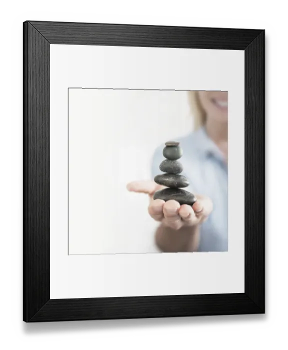 Framed Print : Woman balancing stones Framed Print : Woman balancing stones