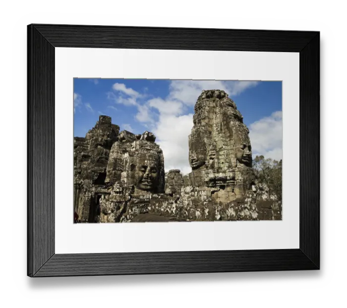 Framed Print : Buddha faces carvings inside Bayon Temple in Angkor Thom complex
