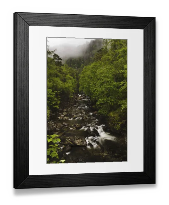 Framed Print : View along river valley with misty slopes above Framed Print : View along river valley with misty slopes above