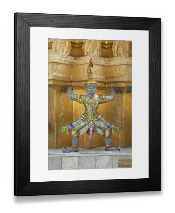 Framed Print : Guardian statue on the base of a golden chedi at Wat Phra Kaeo