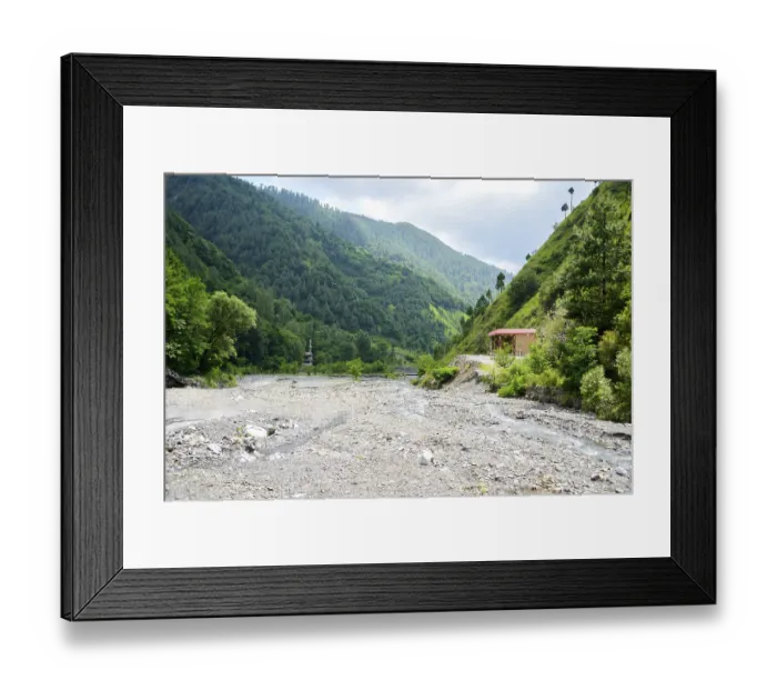Framed Print : Water flowing over river rocks near mountains in Nathia Gali Framed Print : Water flowing over river rocks near mountains in Nathia Gali