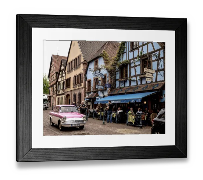 Framed Print : Vintage cars in front of historic half-timbered houses