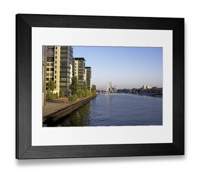 Framed Print : The sculpture Molecule man by Jonathan Borofsky at the east port
