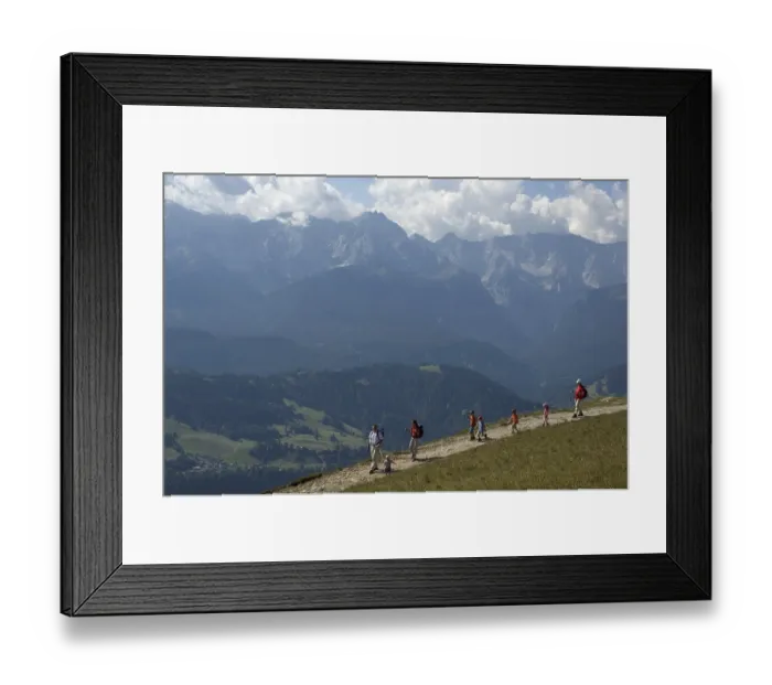 Framed Print : Walker mountain hiker on the Wank near Garmisch-Partenkirchen view to the Zugspitze with the Wetterstein mountains Framed Print : Walker mountain hiker on the Wank near Garmisch-Partenkirchen view to the Zugspitze with the Wetterstein mountains