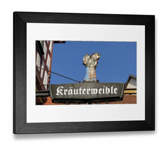 Framed Print : Detail on an old historic half-timbered house in an alley in the imperial palace of Bad Wimpfen
