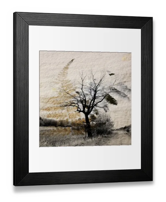Framed Print : A lone tree rises amid a barren winter landscape in Auvergne