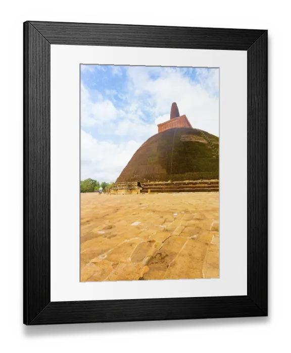 Framed Print : Massive Abhayagiri dagoba or stupa stands atop masonry base with intact spire in the ancient capitol of Anuradhapura