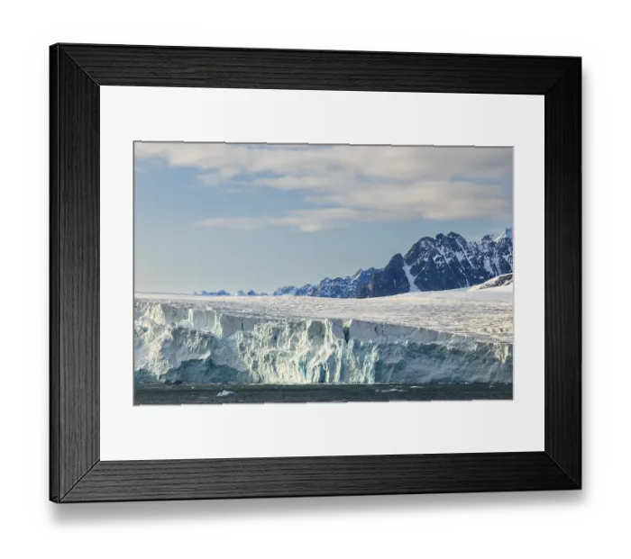 Framed Print : Glacier tongue, ice, edge in front of mountain peak
