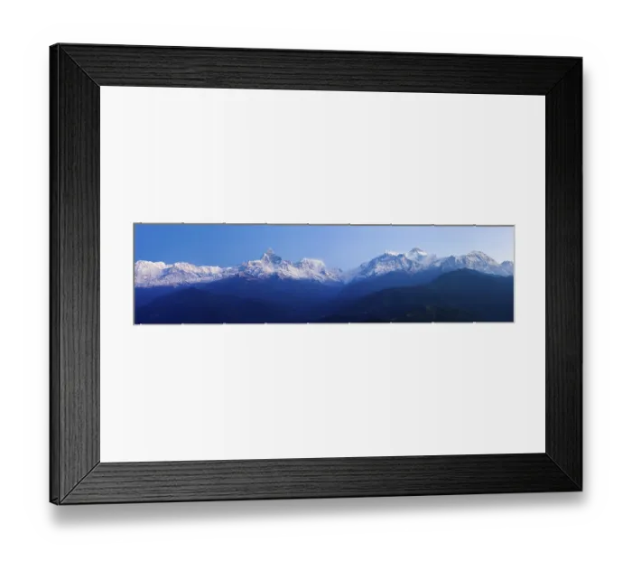 Framed Print : Sweeping panoramic landscape view of snow-capped Annapurna Himalayan mountain range at early morning in Nepal