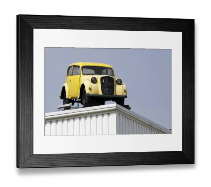 Framed Print : Classic car on a roof in Herford