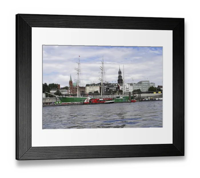 Framed Print : Hamburg harbour view with ships and clock tower by day