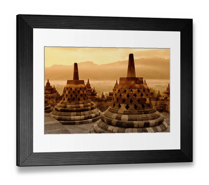 Framed Print : Ancient stupas in Borobudur temple during a warm sunrise Framed Print : Ancient stupas in Borobudur temple during a warm sunrise