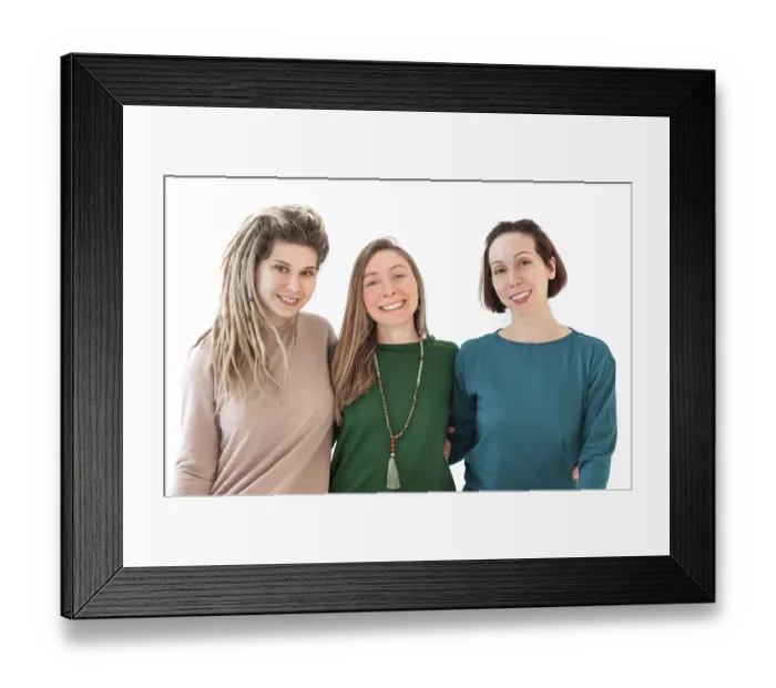 Framed Print : Happy young women smiling after meditating against white wall during yoga session