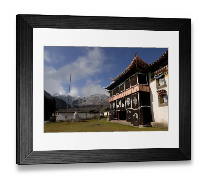 Framed Print : Tibetan Taktsang Lhamo Kirti Monastery in front of snow-covered mountains