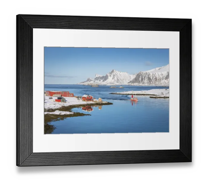 Framed Print : Red farmhouse and fishing boat are reflected in the fjord Rossoy Straumen