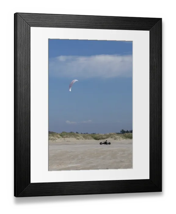 Framed Print : Ringby, Denmark - 30 May, 2021: kite buggy enjoying a windy day on the Wadden Sea island beaches of western Denmark Framed Print : Ringby, Denmark - 30 May, 2021: kite buggy enjoying a windy day on the Wadden Sea island beaches of western Denmark