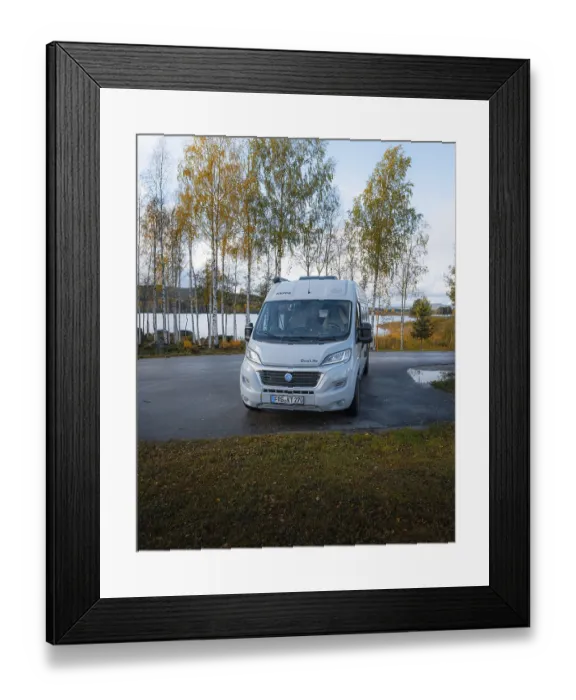 Framed Print : Campervan at resting place in front of autumn birch trees and lake
