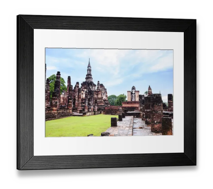 Framed Print : Sukhothai style chedi and standing buddha image in sukhothai historical park
