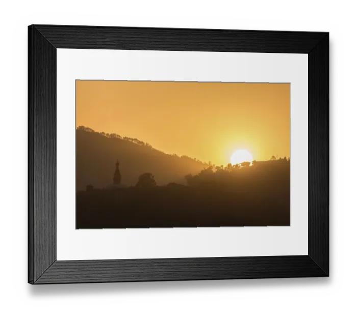Framed Print : Hills with trees and buddhist temple at sunset