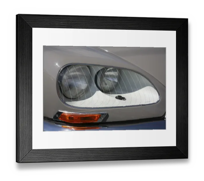 Framed Print : Look out for the model car in the headlights of this classic car!