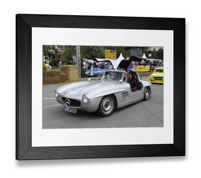 Framed Print : A silver Mercedes classic car with gullwing doors and starting number 417 at a festival Framed Print : A silver Mercedes classic car with gullwing doors and starting number 417 at a festival