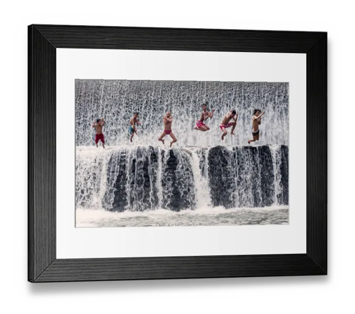 Framed Print : Boys jumping into a waterfall and having fun