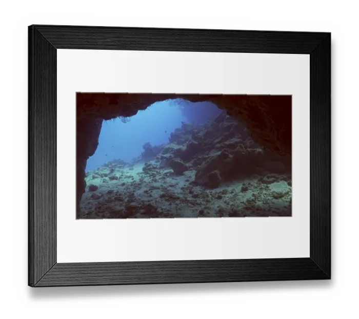 Framed Print : Coral caves on sunny day in bright sunlight