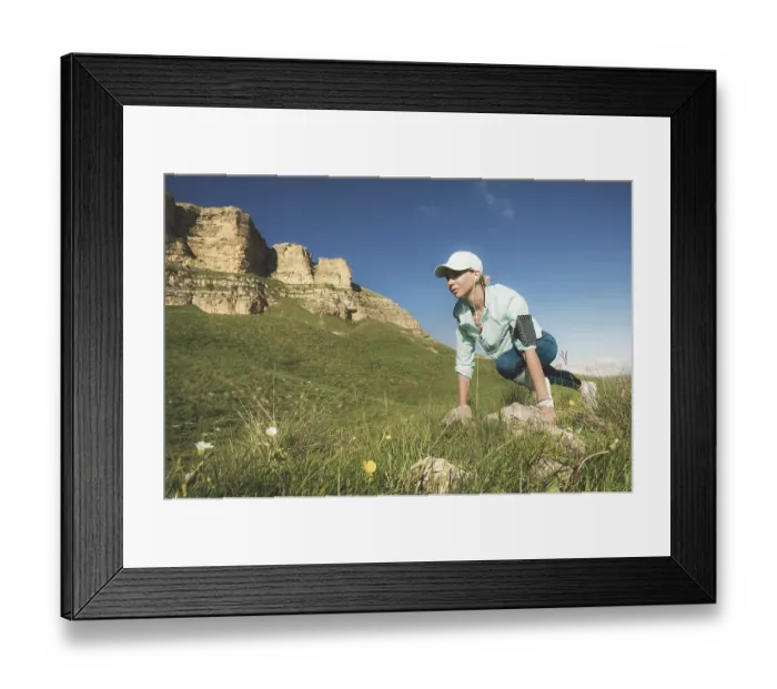 Framed Print : Athletic woman was ready to run at the foot of the rocks Framed Print : Athletic woman was ready to run at the foot of the rocks