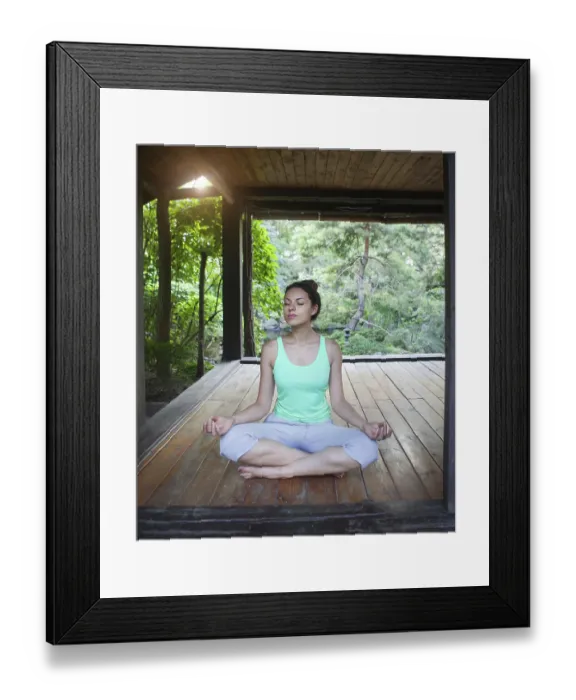 Framed Print : Young woman doing yoga asana in the evening outdoors