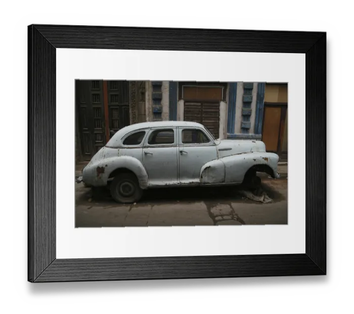 Framed Print : Vintage car wreck on a street in Havana