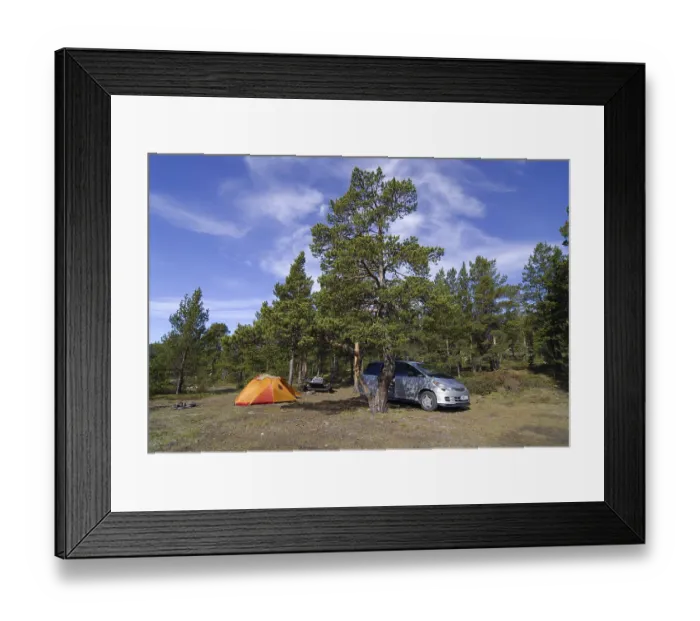 Framed Print : Lone car and orange tent at a campsite