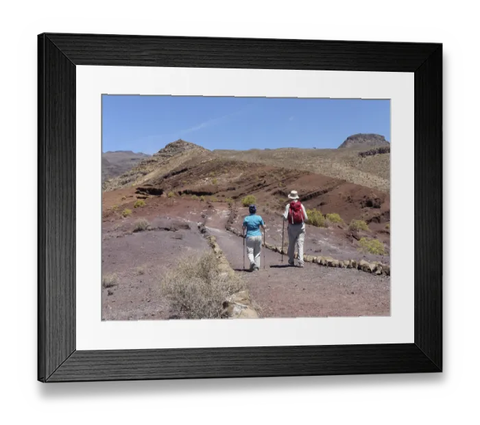 Framed Print : Hikers, Sendero Quise trail, Calvario mountain at the back Framed Print : Hikers, Sendero Quise trail, Calvario mountain at the back