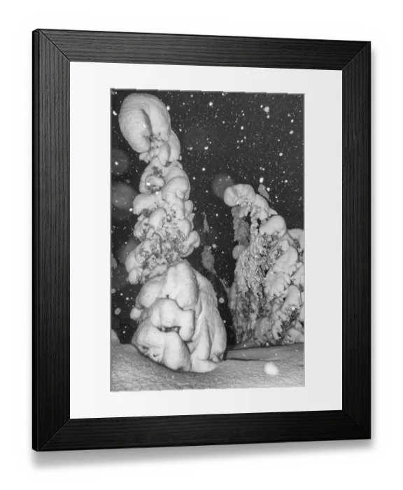 Framed Print : Snowfall in a snow-covered landscape