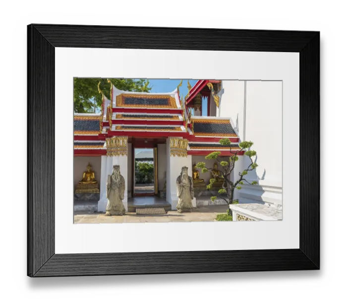 Framed Print : Chinese guardian figures beside a gate at the cloister of the Wat Pho temple in Bangkok