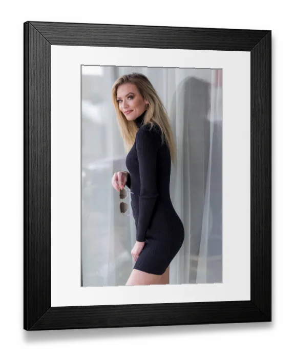 Framed Print : A gorgeous blonde model poses outdoors while enjoying the fall weather