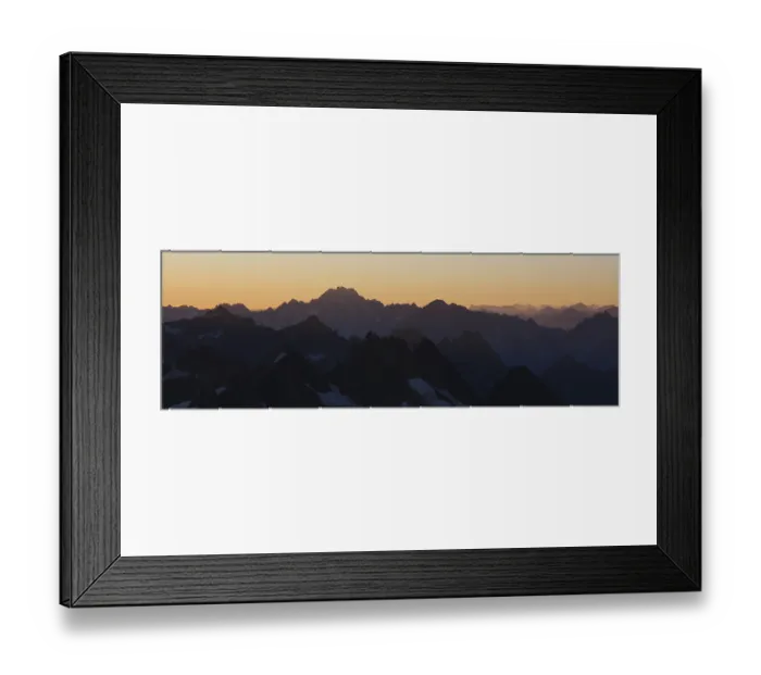 Framed Print : Golden morning light over rugged Swiss mountains