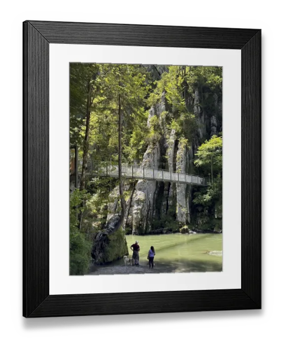 Framed Print : Gorge with a footbridge, steep cliffs and walkers