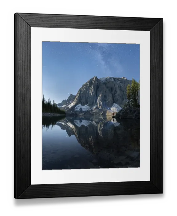 Framed Print : A serene mountain landscape with calm lake reflections under a starry night sky