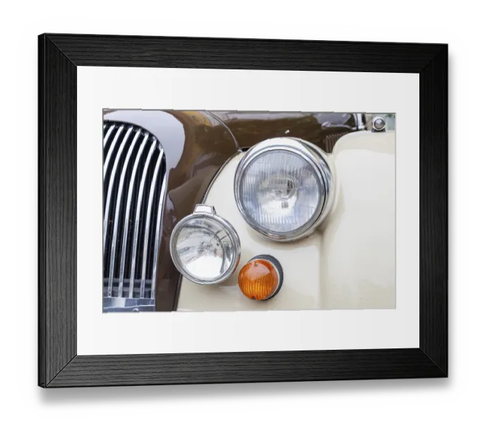 Framed Print : Headlights, indicators and radiator grille of a British sports car from the seventies Framed Print : Headlights, indicators and radiator grille of a British sports car from the seventies