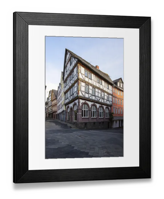 Framed Print : Old half-timbered houses in a town