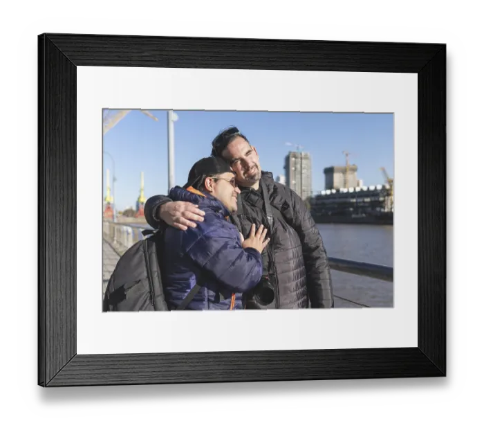 Framed Print : Tourist gay couple posing in Puerto Madero Framed Print : Tourist gay couple posing in Puerto Madero