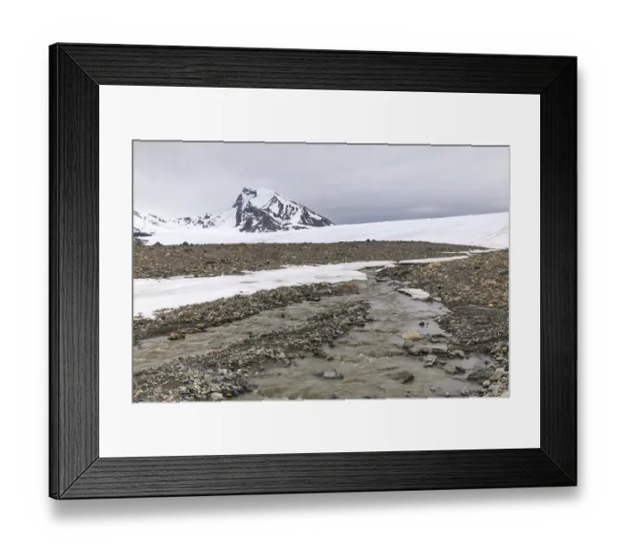 Framed Print : Melting glacier, stones, water