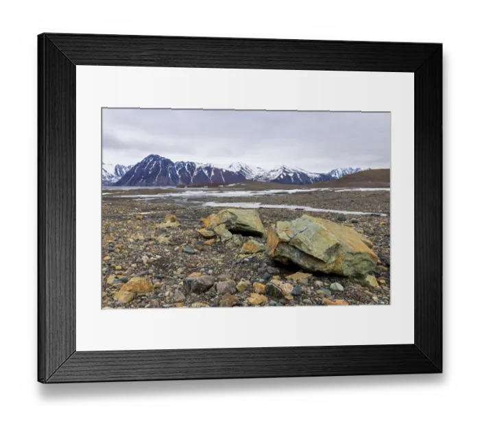 Framed Print : Melting glacier, copper-bearing stones