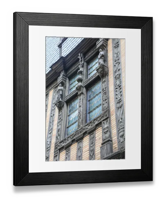 Framed Print : Half-timbered house with rich wood carvings in the old town centre of Le Mans