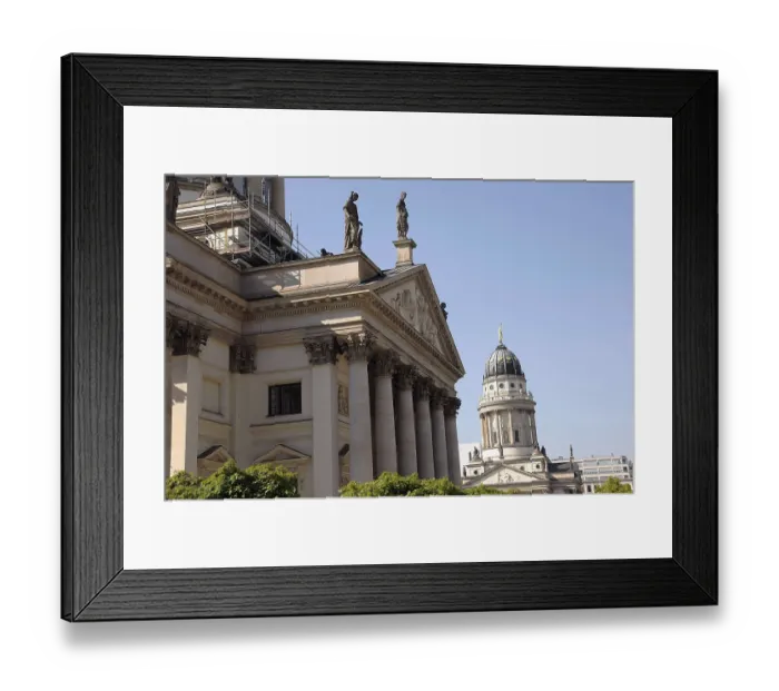 Framed Print : Close-up of historic neoclassical architecture with statues and a cathedral under a clear sky Framed Print : Close-up of historic neoclassical architecture with statues and a cathedral under a clear sky